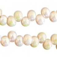 Glaskralen 8mm A-symetrisch Light gold topaz-half diamond coating