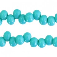 Glass beads 6mm A-symmetrical Blue zircon